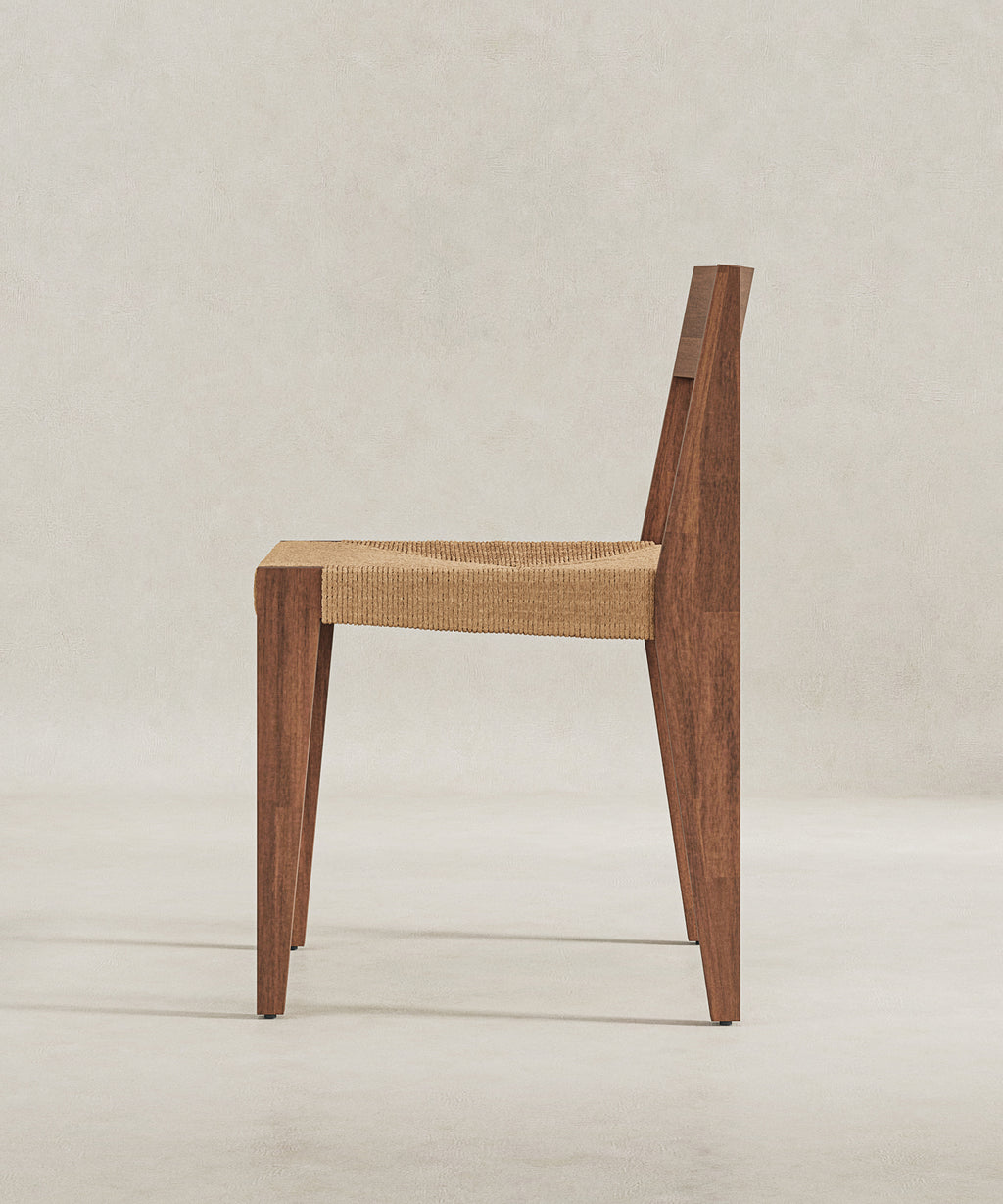 My Store Bhodi dining chair with wooden legs and a cushioned fabric seat, modern design for dining rooms and kitchens.