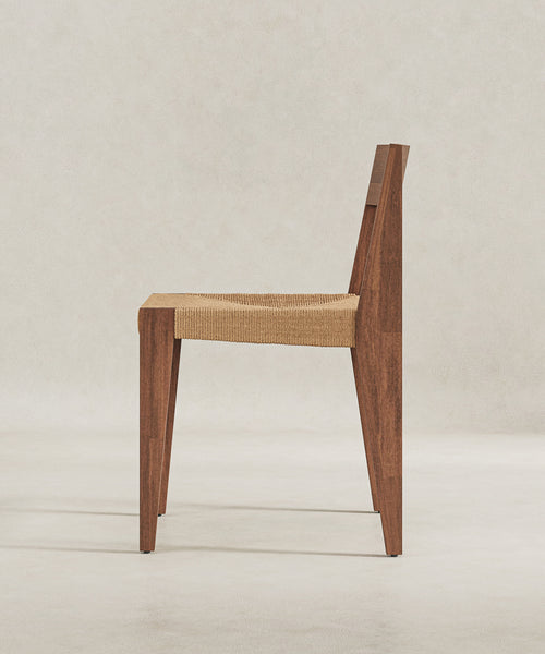 My Store Bhodi dining chair with wooden legs and a cushioned fabric seat, modern design for dining rooms and kitchens.